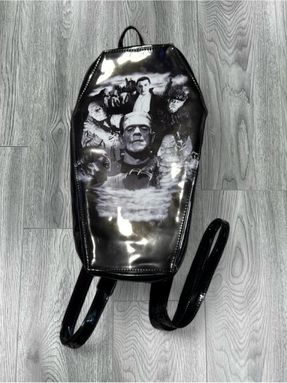 Black Coffin-Shaped Graphic Backpack — Gothic Monster Collage